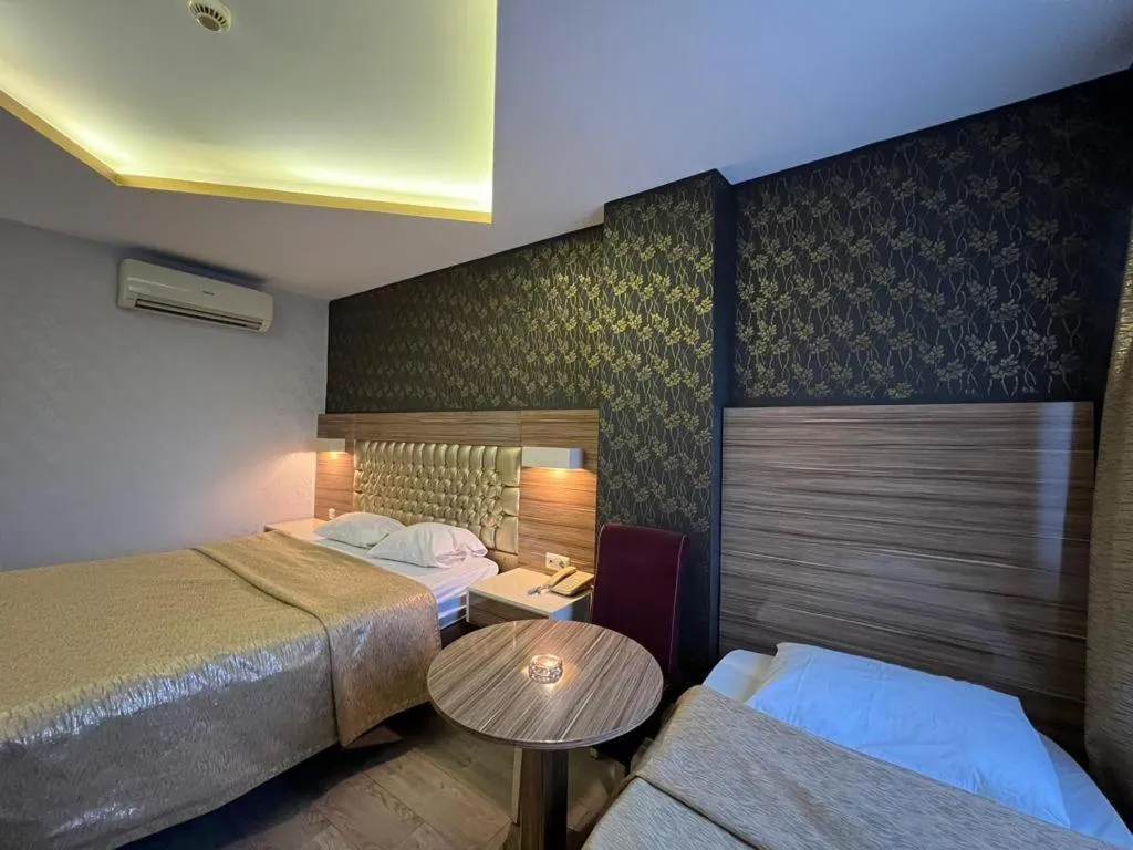 Bed in Grand Ezel Hotel