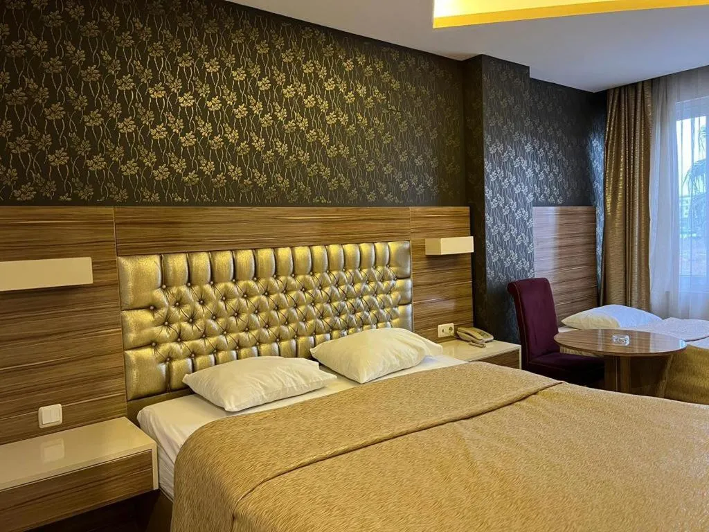 Bed in Grand Ezel Hotel