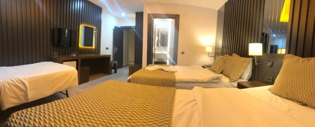 Bed in Grand Ezel Hotel