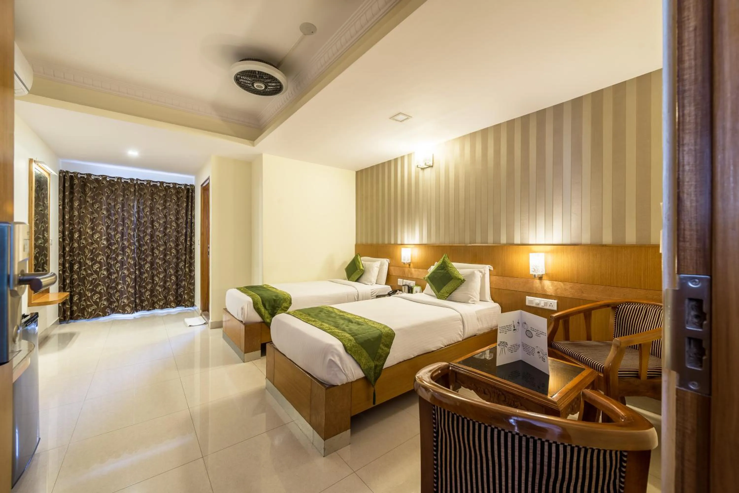 Bed in Treebo Akshaya Lalbagh Inn