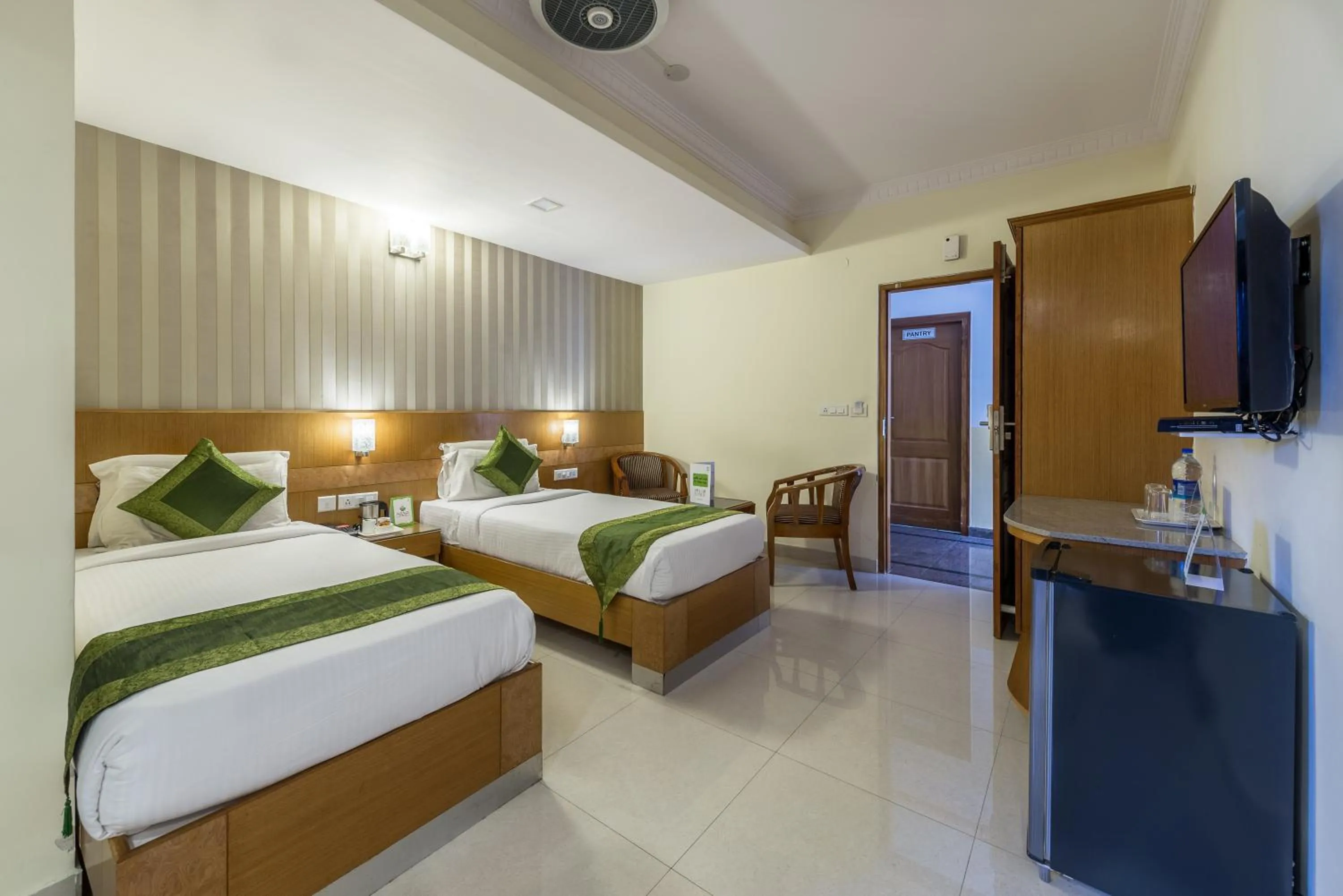 Bed in Treebo Akshaya Lalbagh Inn