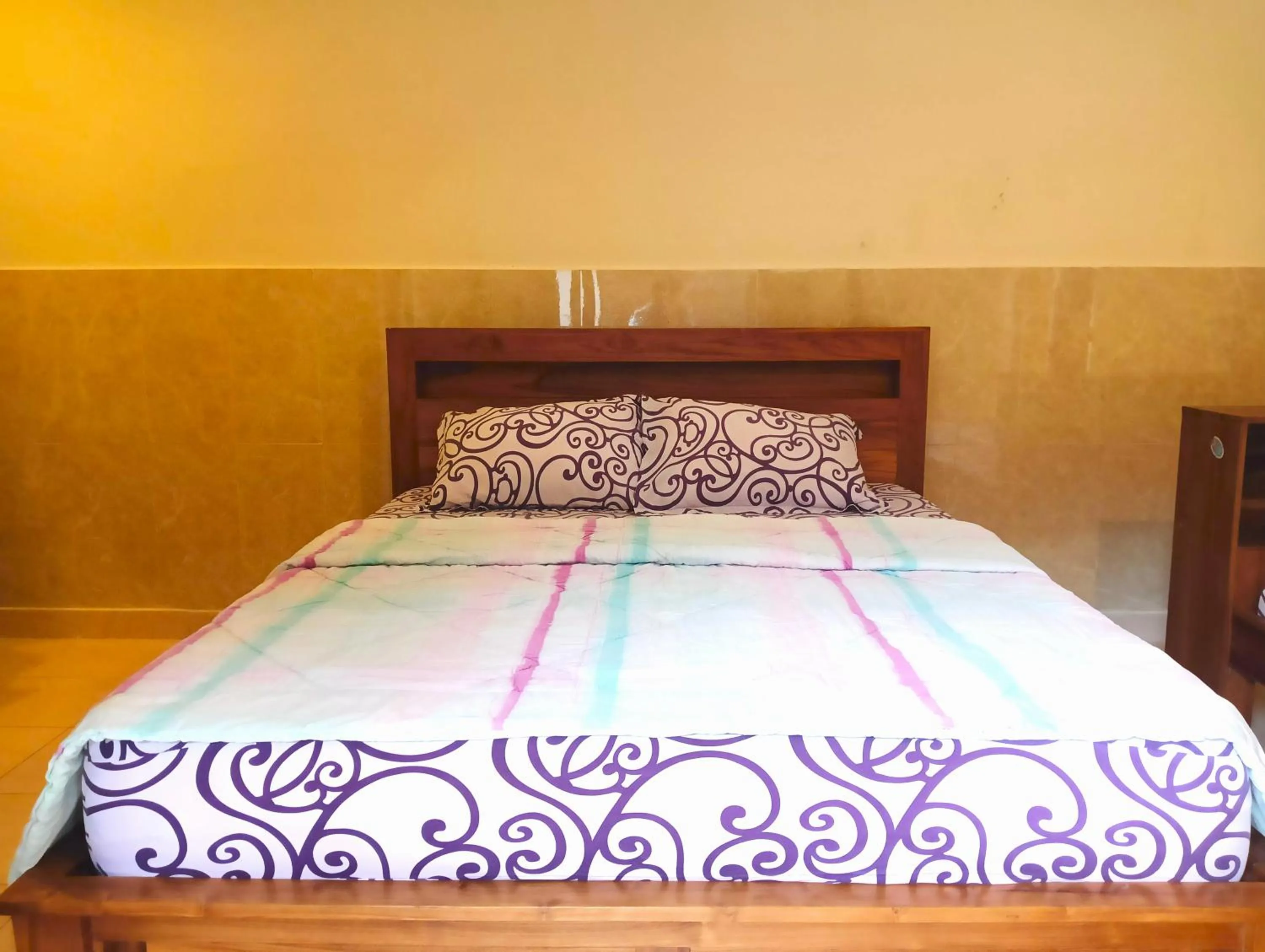 Bed in Puri Asri Bungalow Ubud