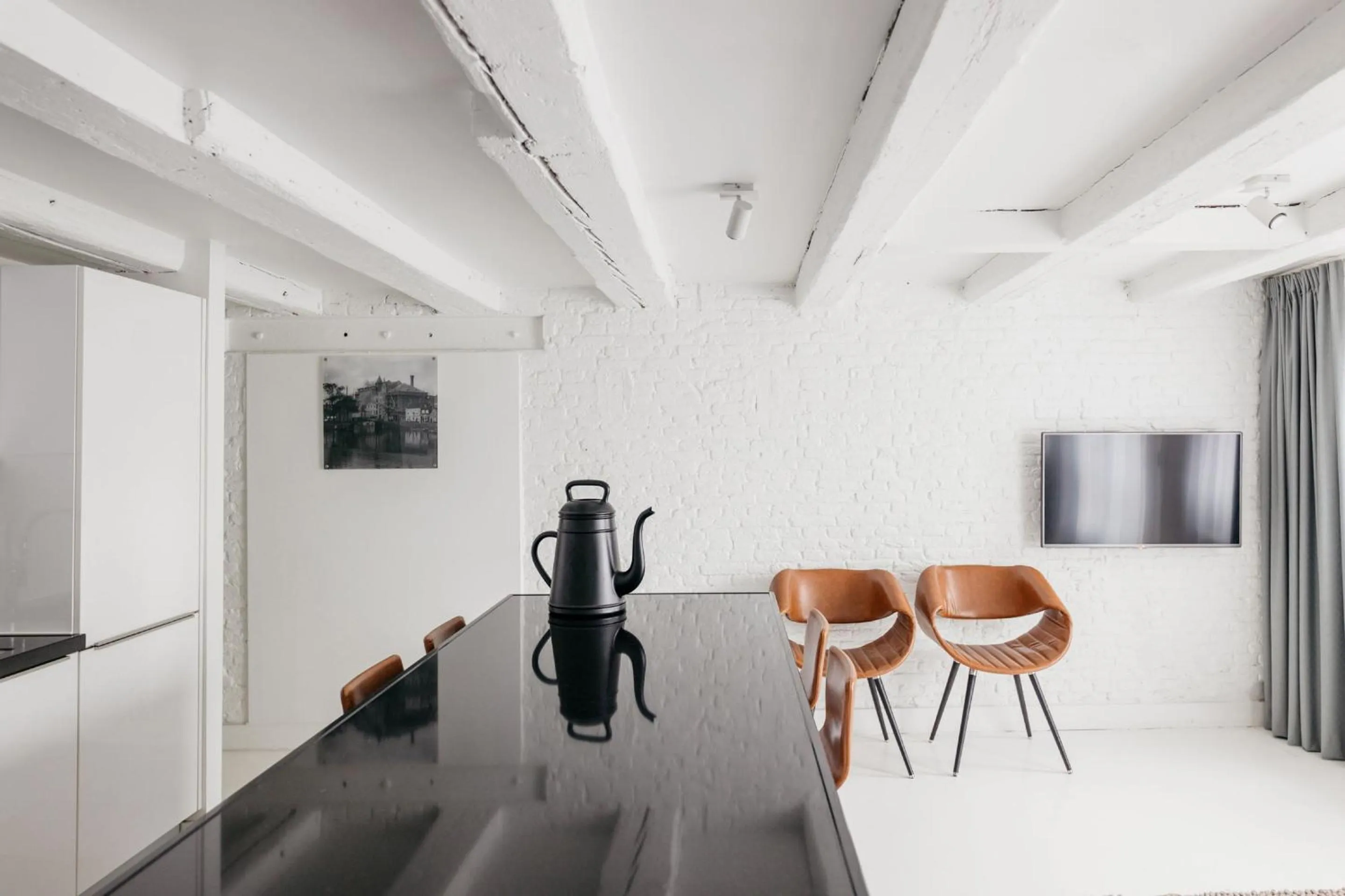 Dining area in YAYS Amsterdam Salthouse Canal by Numa