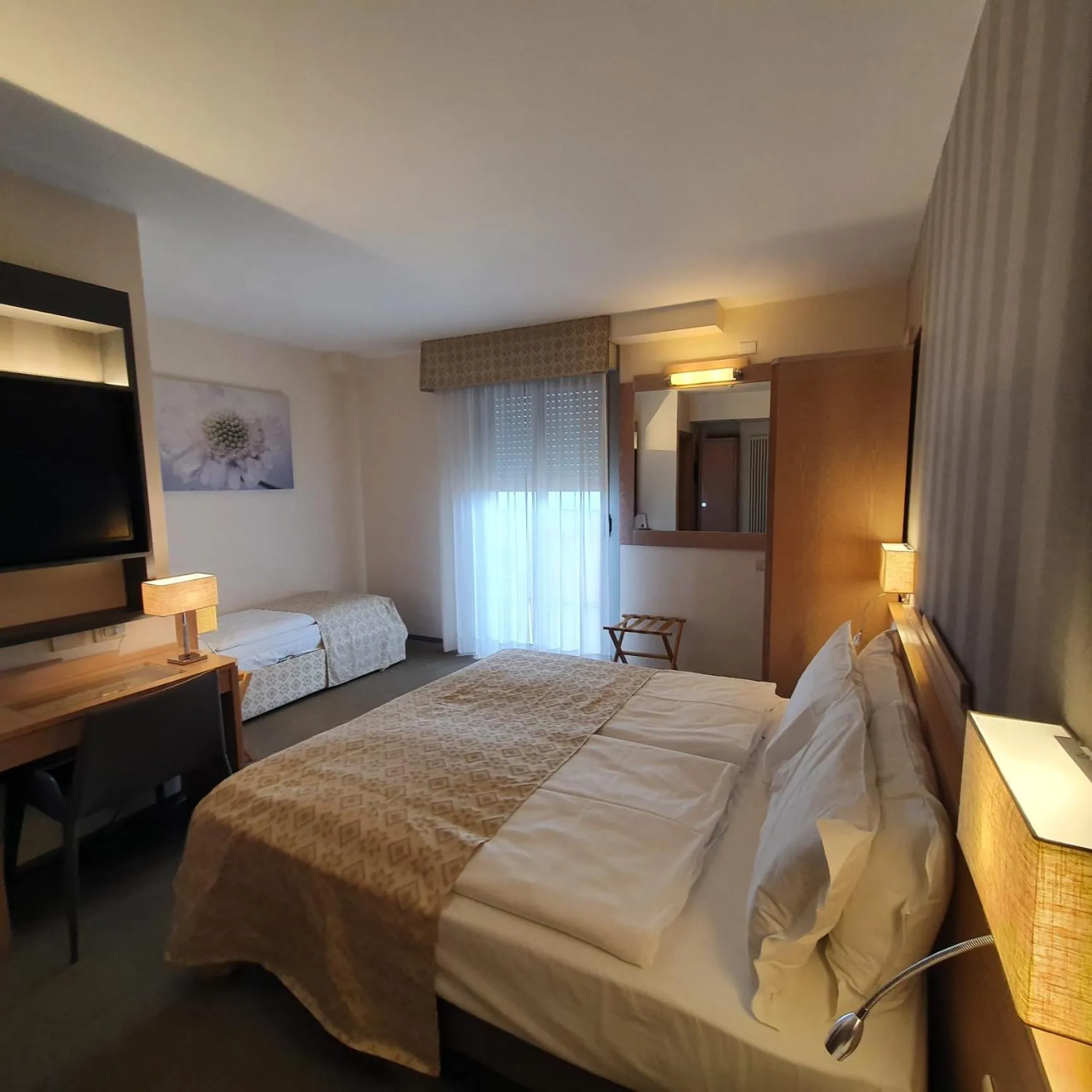 Photo of the whole room, Bed in Hotel Europa Lignano