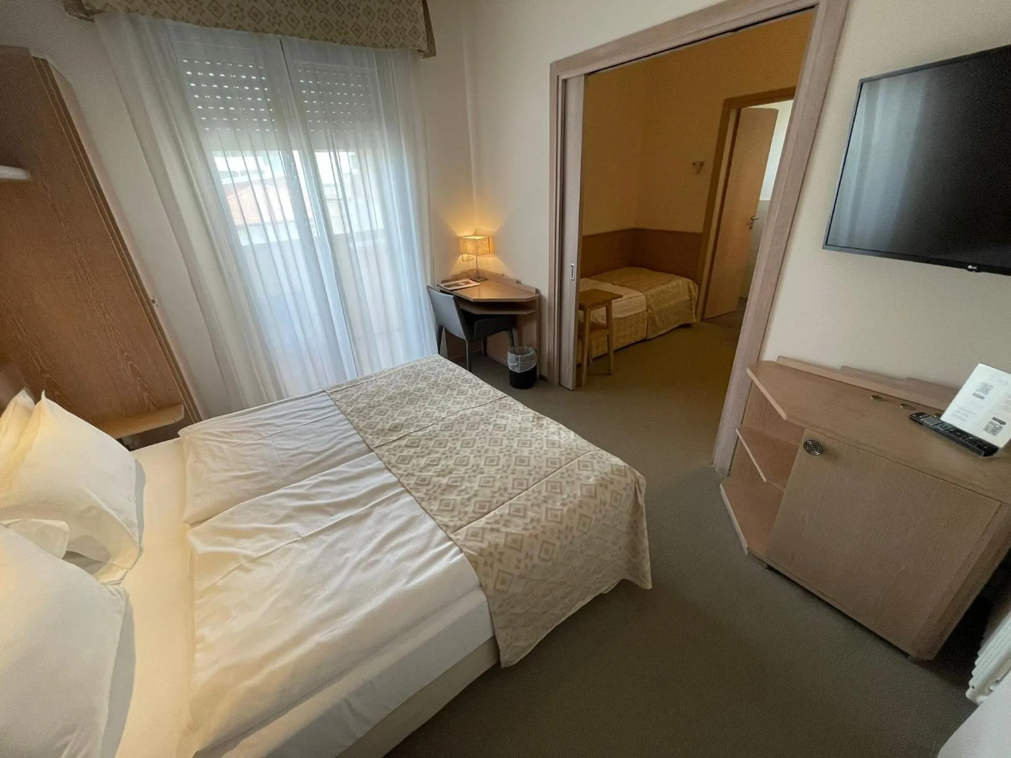 Photo of the whole room, Bed in Hotel Europa Lignano