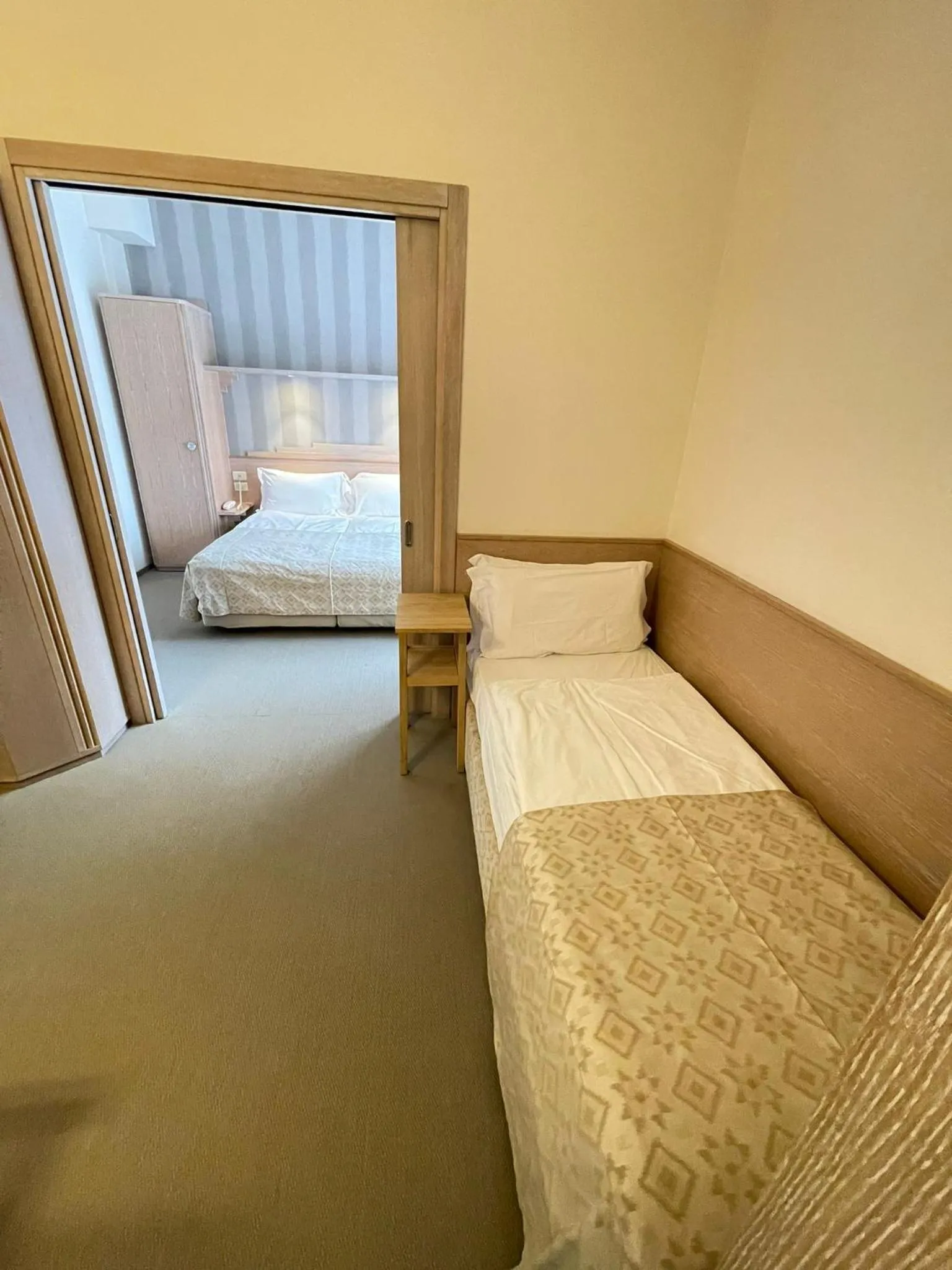 Photo of the whole room, Bed in Hotel Europa Lignano