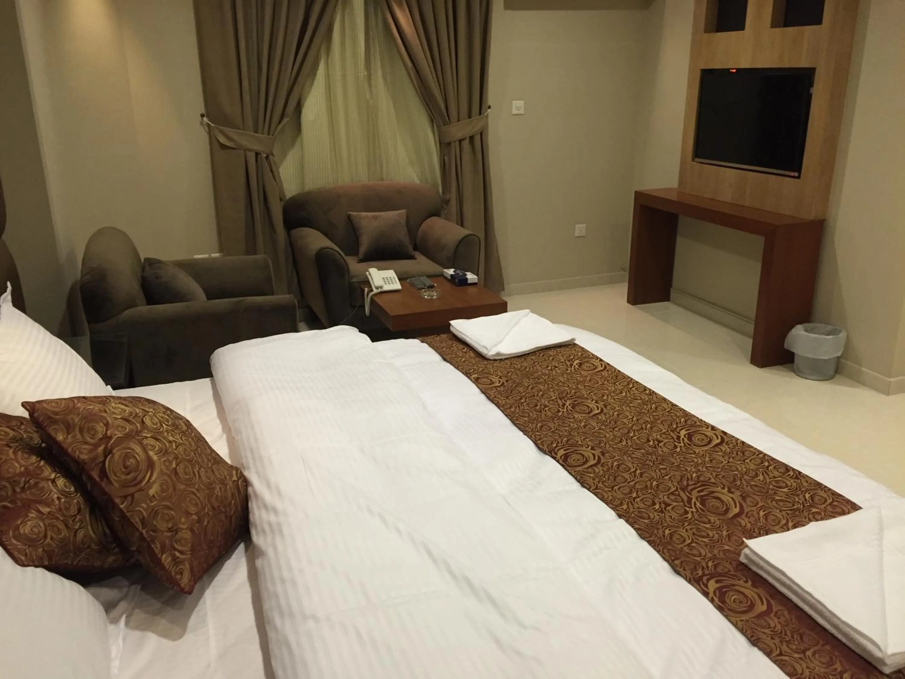 Bed in Ashbonh Hotel Suites