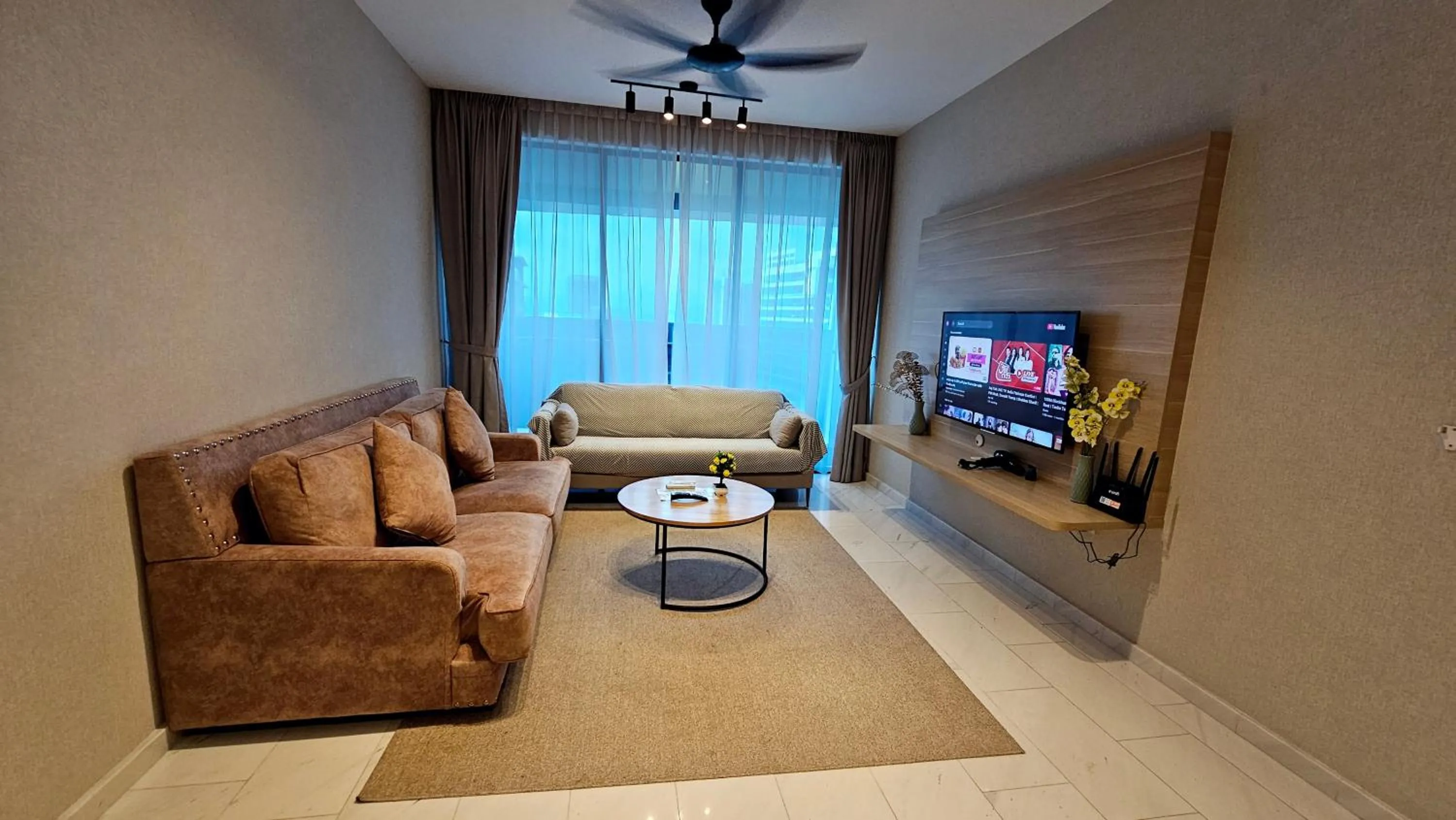 Communal lounge/ TV room in Crystal Service Suite At Eaton KLCC