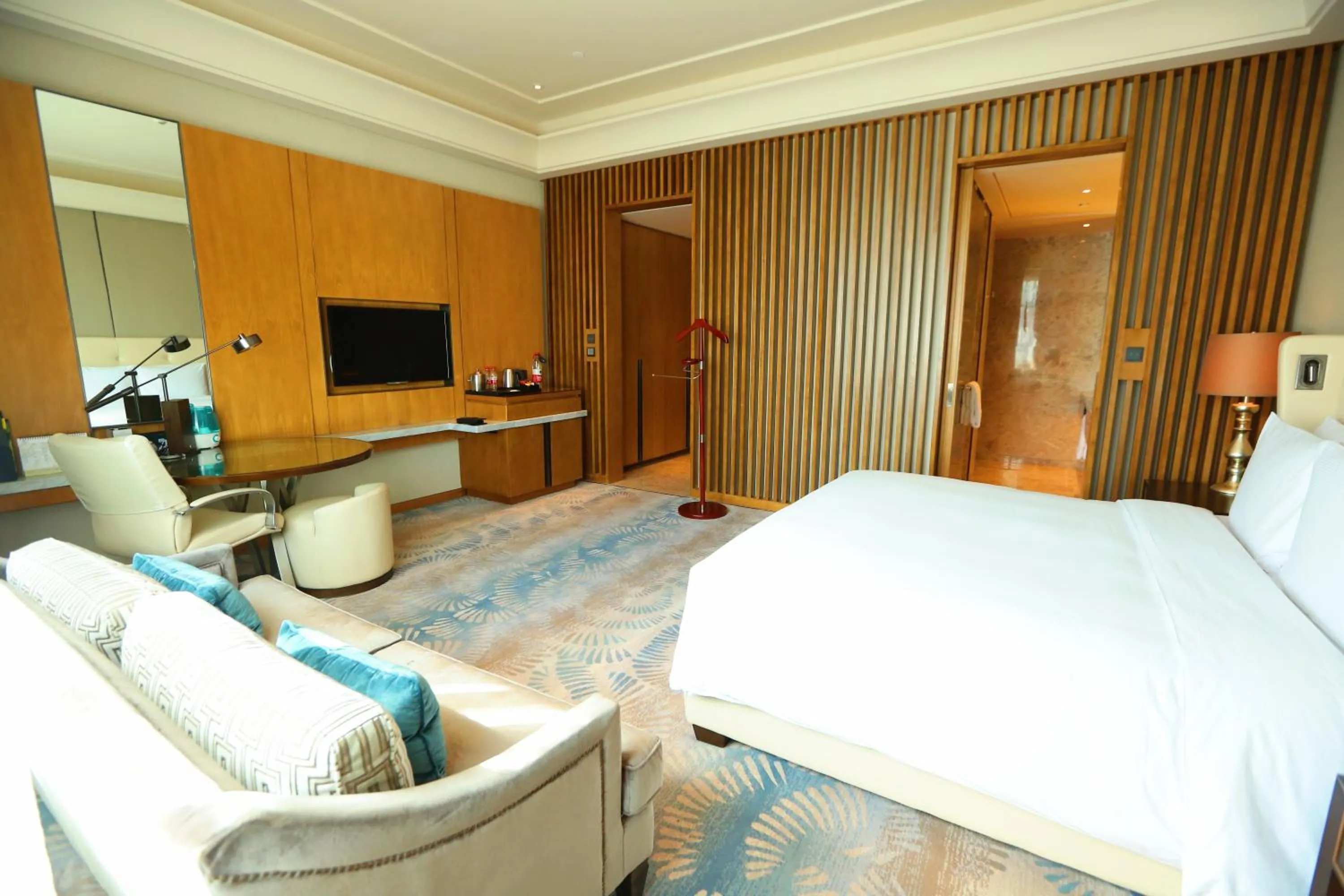 Seating area, Bed in Hilton Urumqi
