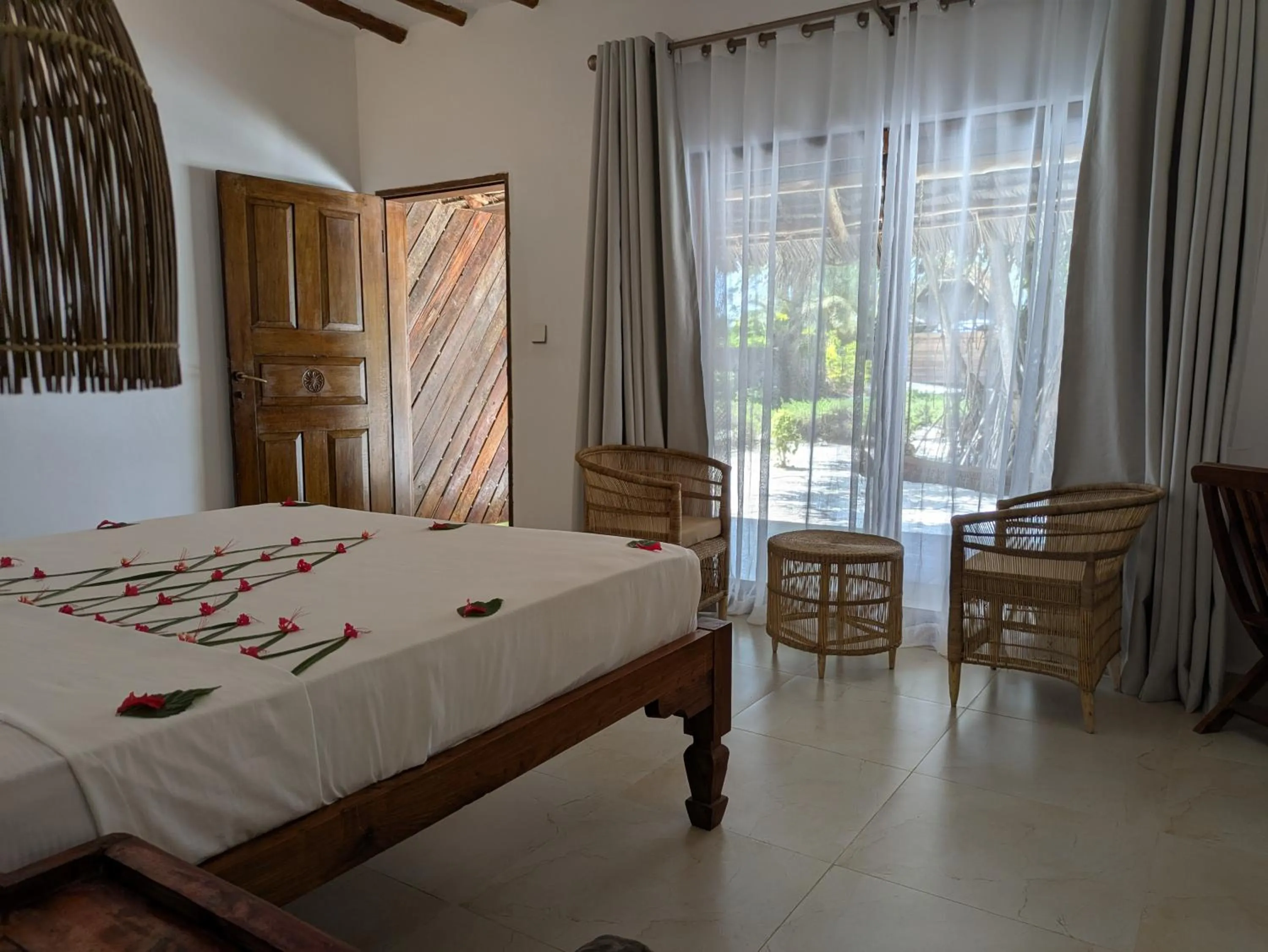 Bedroom, Bed in Hakuna Majiwe Beach Lodge