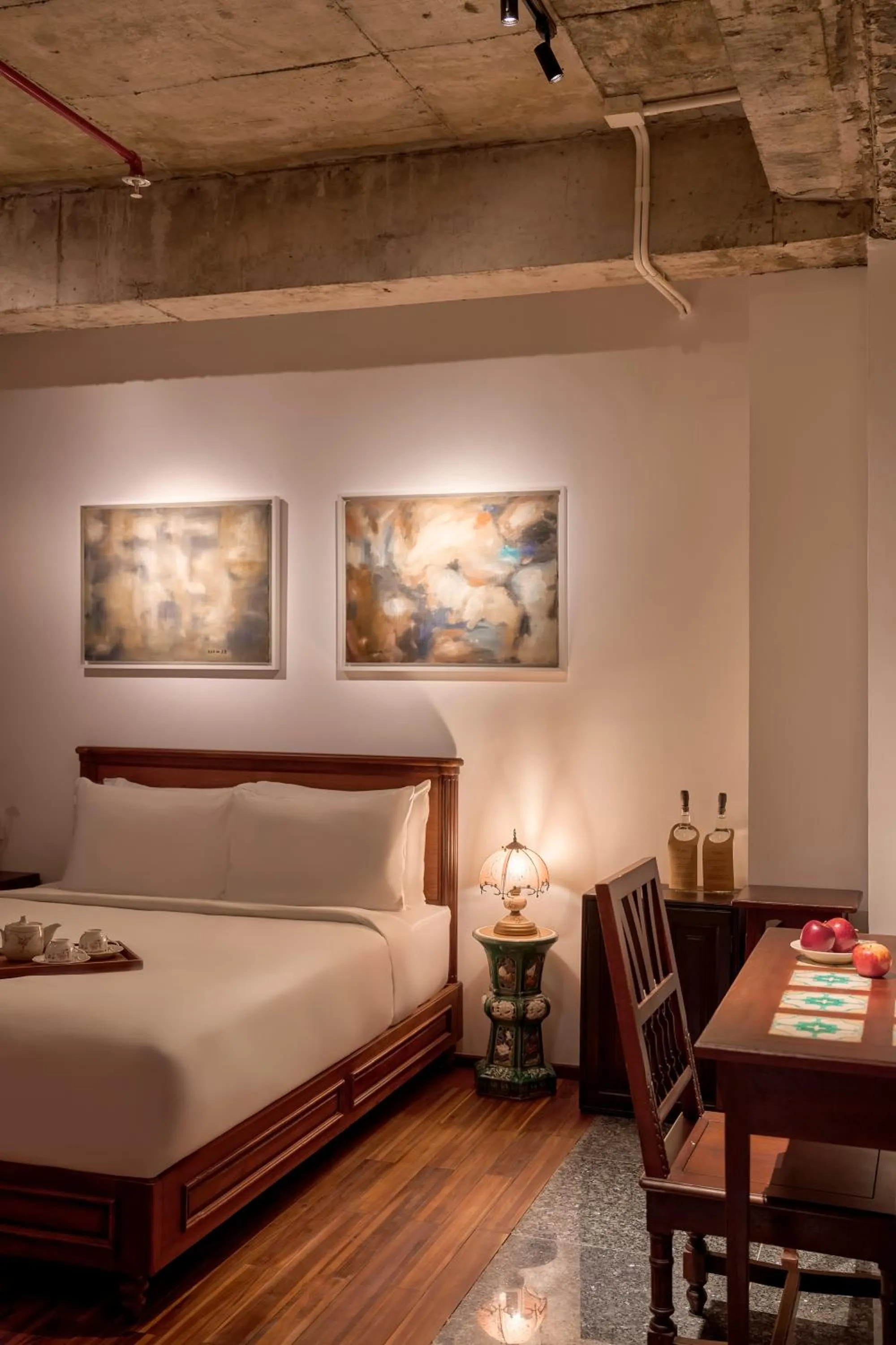 Living room, Bed in Anima Saigon Boutique - Vietnamese Contemporary Art Hotel