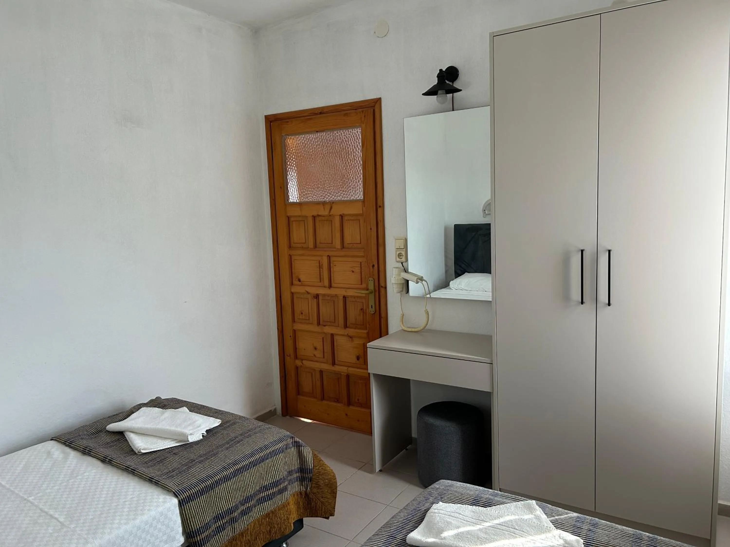 Bed in Ege Apartments