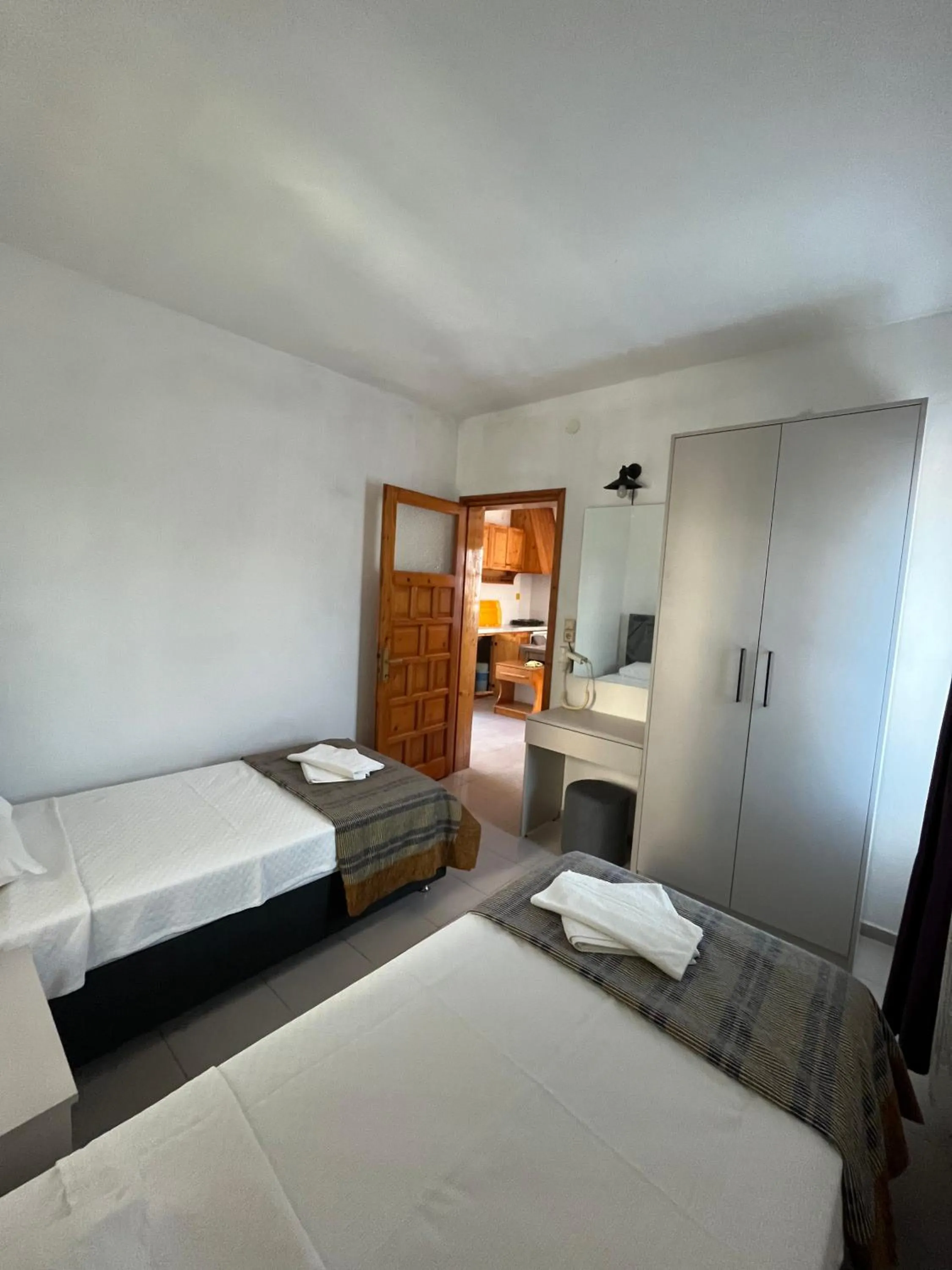 Bed in Ege Apartments