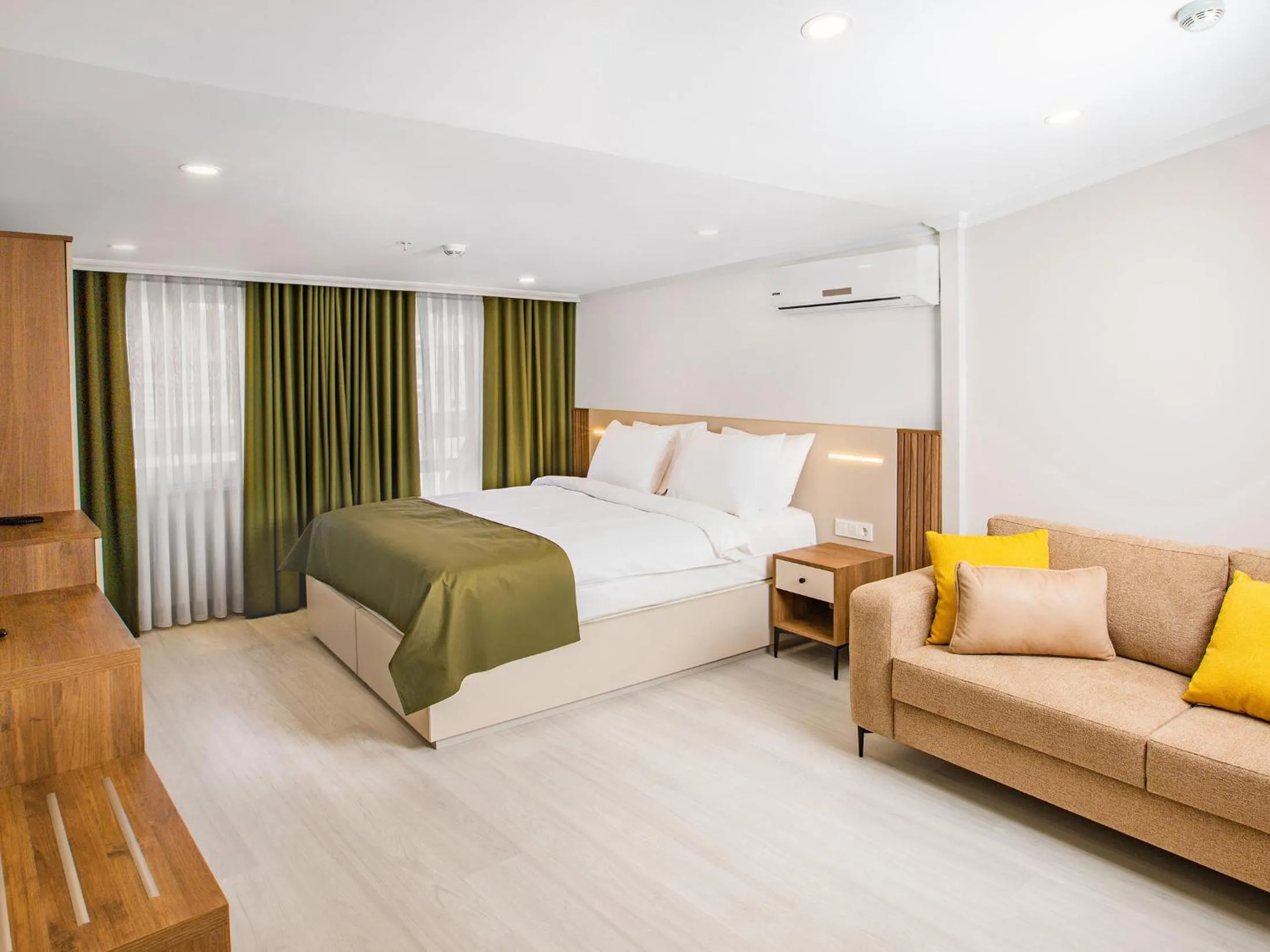 Bed in Quinnova Hotel