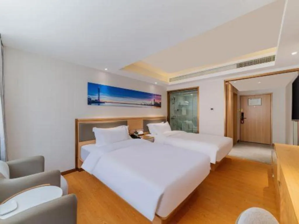 Bed in Guangzhou New Tianhe Hotel