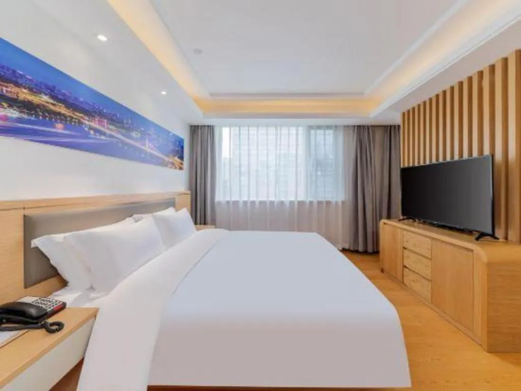 Bed in Guangzhou New Tianhe Hotel