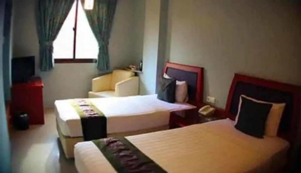 Bed in Rama Garden Hotel