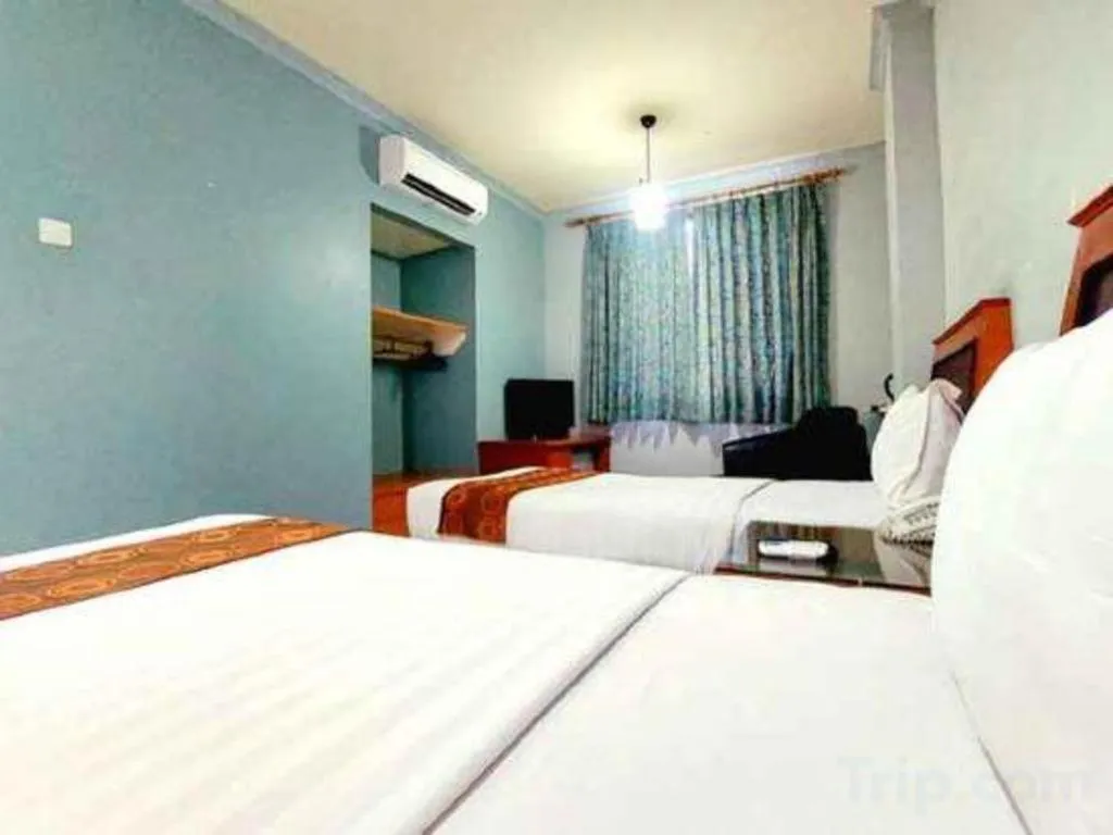 Bed in Rama Garden Hotel