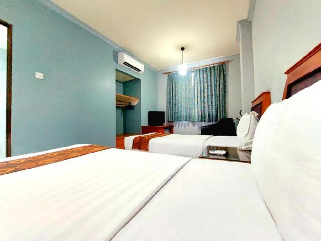 Bed in Rama Garden Hotel