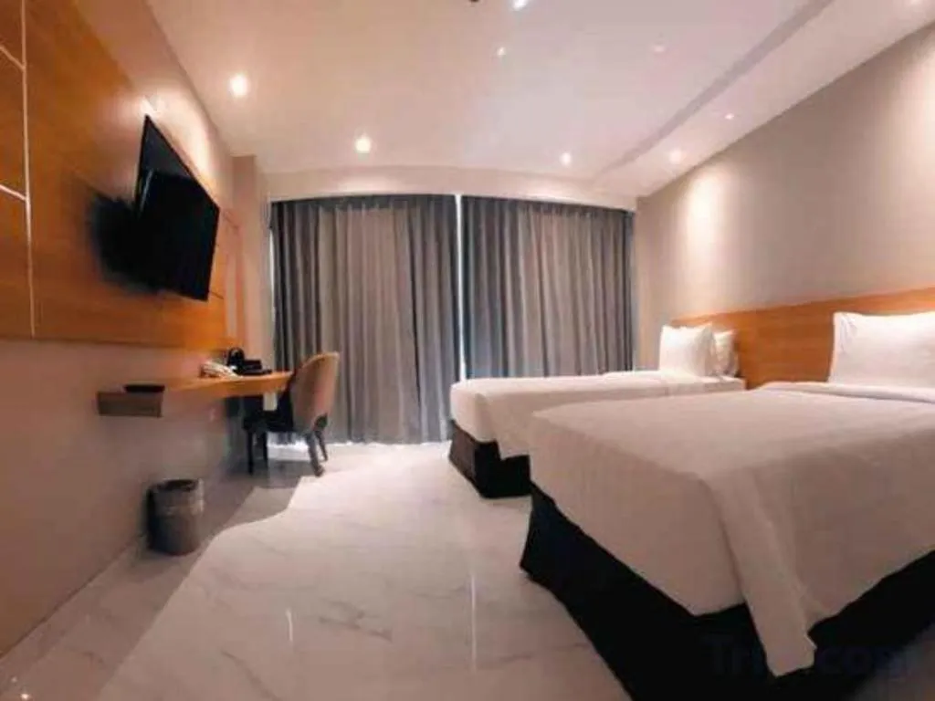 Bed in Rama Garden Hotel