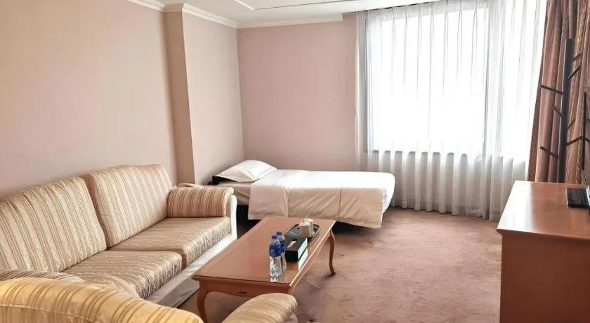 Bed in The Twenty First Century Hotel