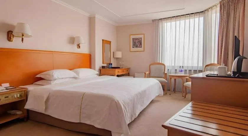 Bed in The Twenty First Century Hotel