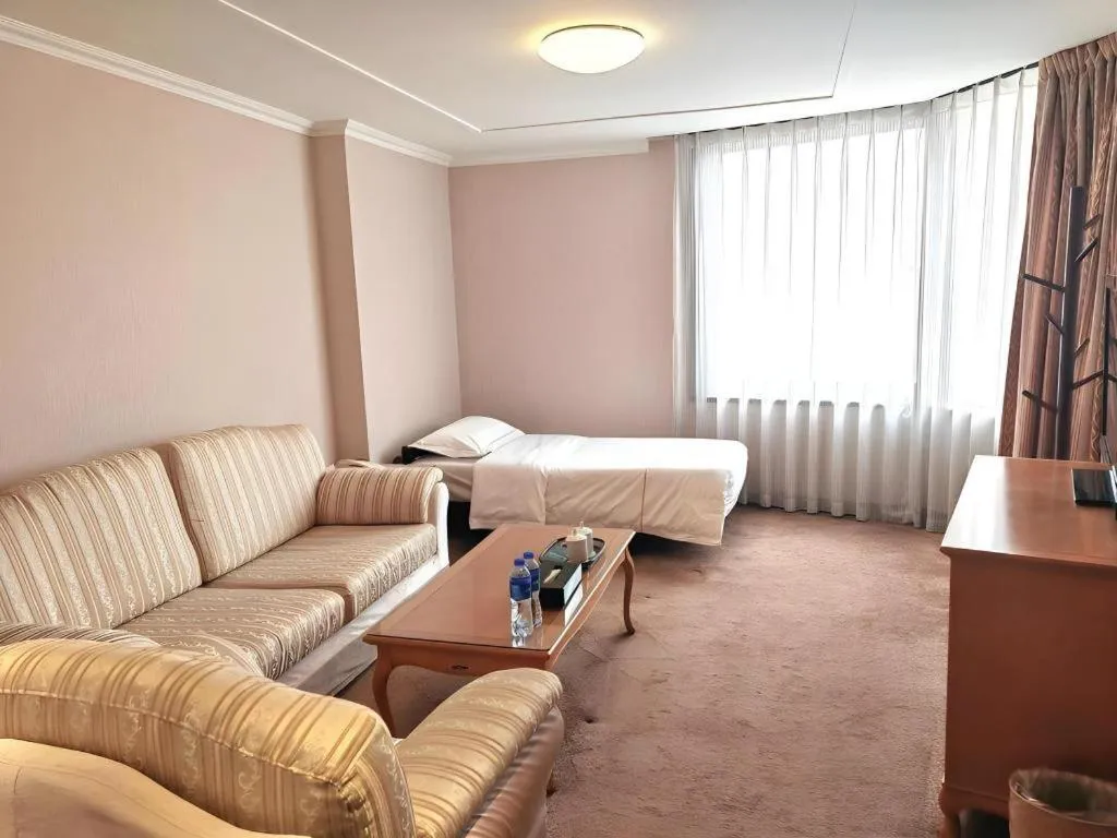 Bed in The Twenty First Century Hotel