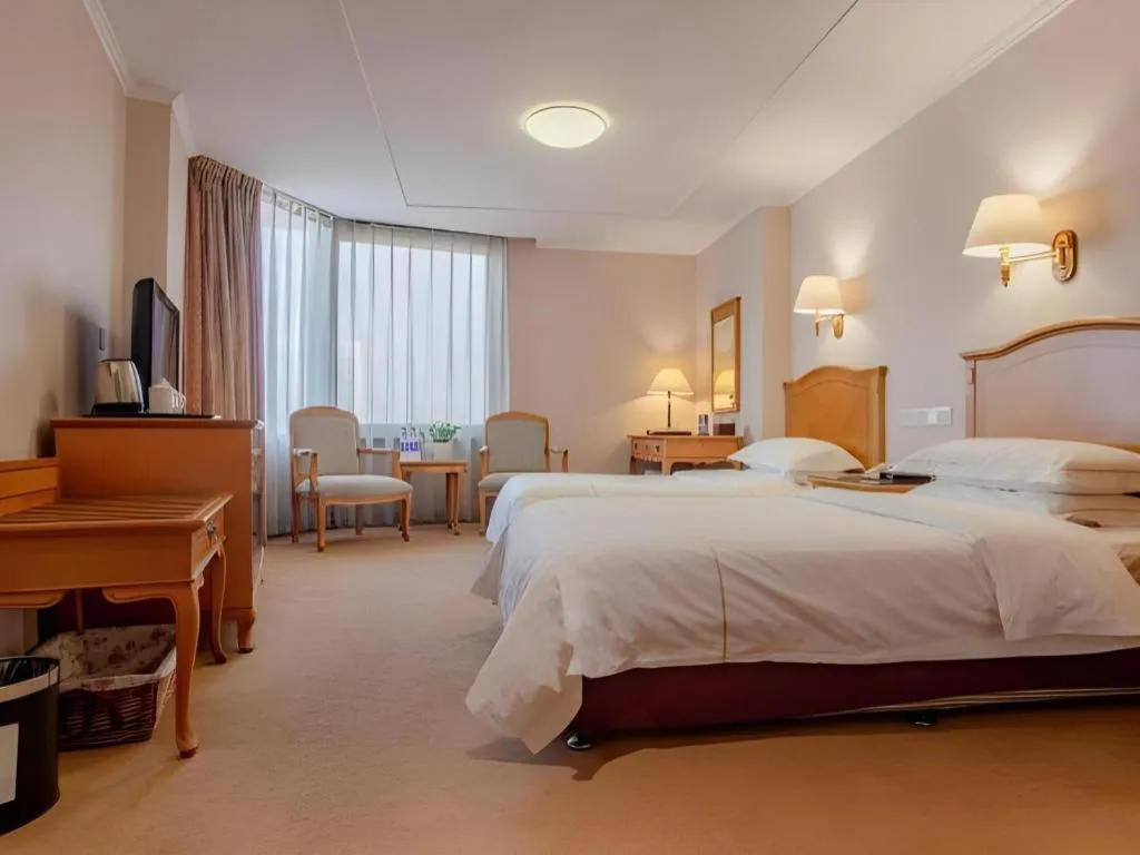 Bed in The Twenty First Century Hotel