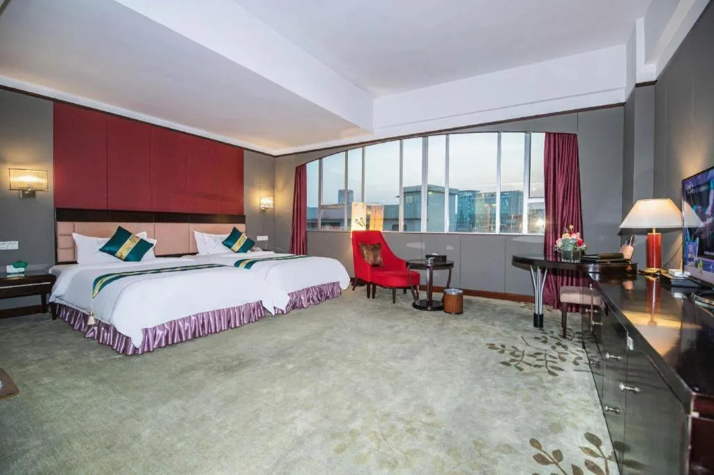 Bed in Shunde Emperor Hotel