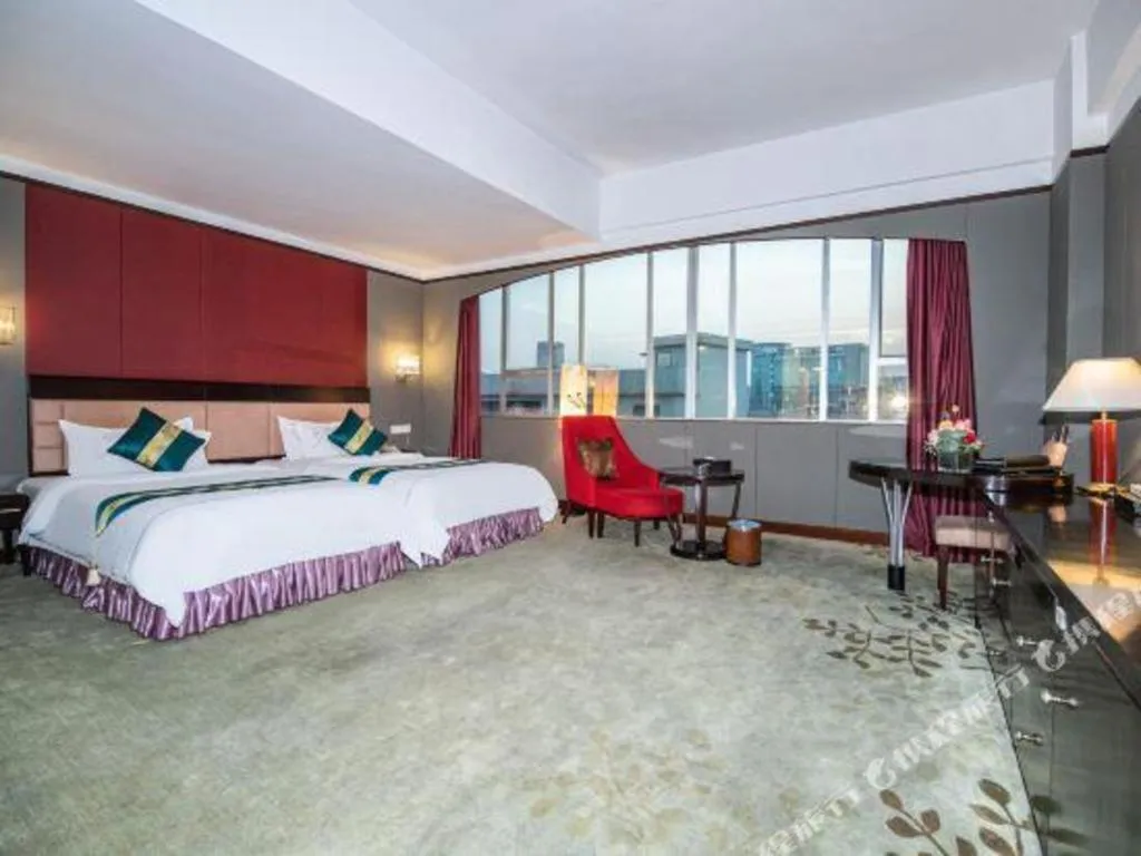 Bed in Shunde Emperor Hotel