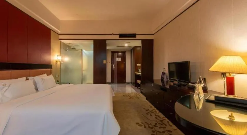 Bed in Shunde Emperor Hotel