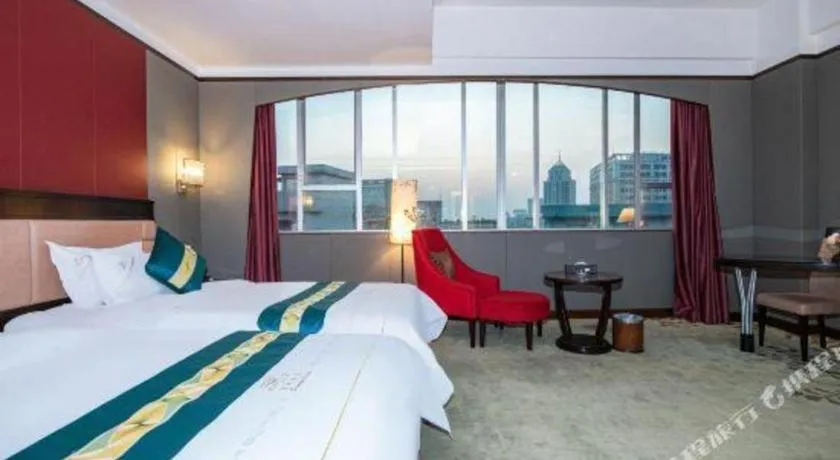 Bed in Shunde Emperor Hotel