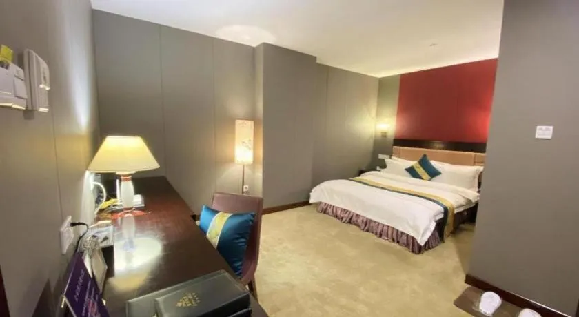 Bed in Shunde Emperor Hotel