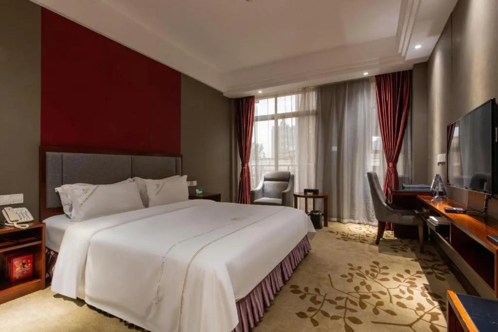 Bed in Shunde Emperor Hotel