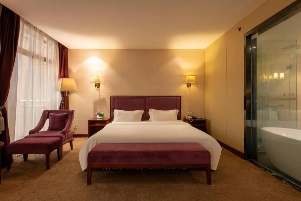 Bed in Shunde Emperor Hotel