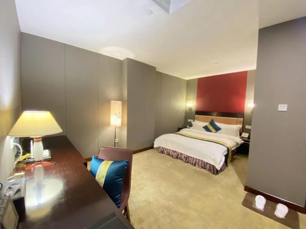 Bed in Shunde Emperor Hotel