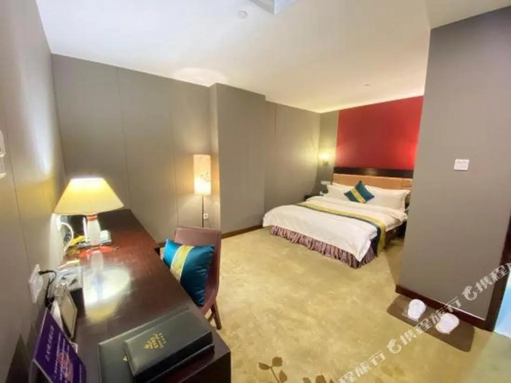 Bed in Shunde Emperor Hotel