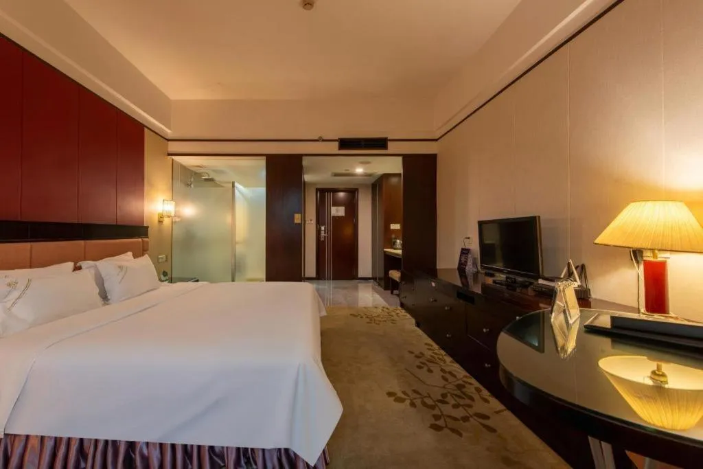 Bed in Shunde Emperor Hotel