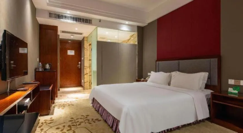 Bed in Shunde Emperor Hotel