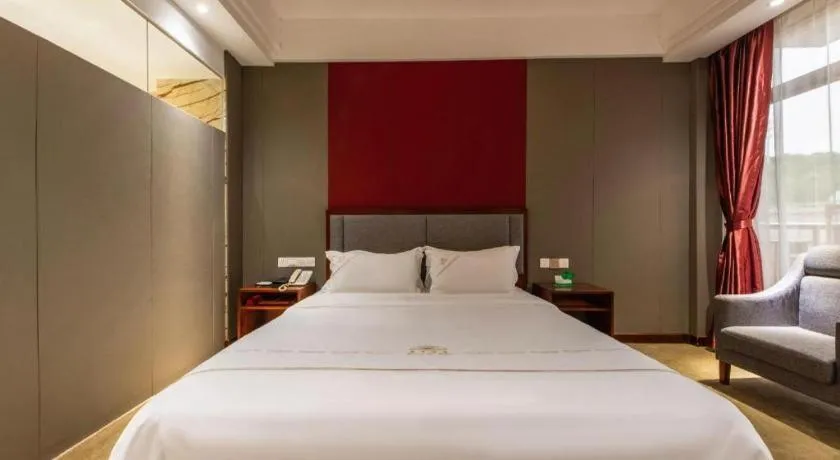 Bed in Shunde Emperor Hotel