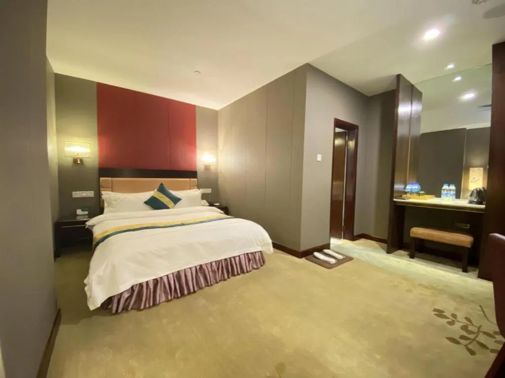 Bed in Shunde Emperor Hotel