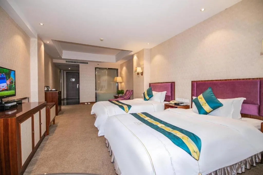 Bed in Shunde Emperor Hotel