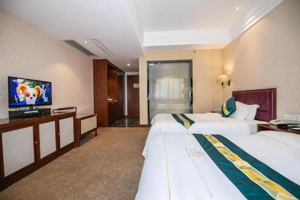 Bed in Shunde Emperor Hotel