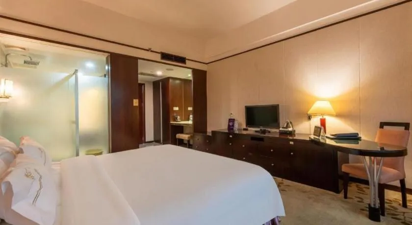 Bed in Shunde Emperor Hotel