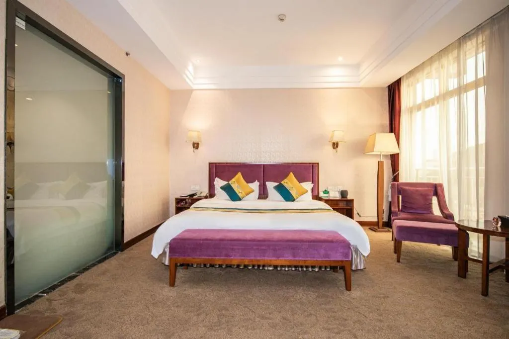 Bed in Shunde Emperor Hotel