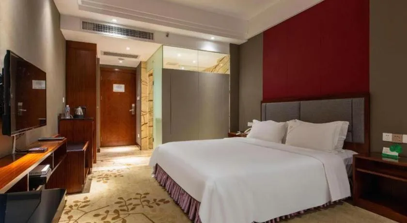 Bed in Shunde Emperor Hotel