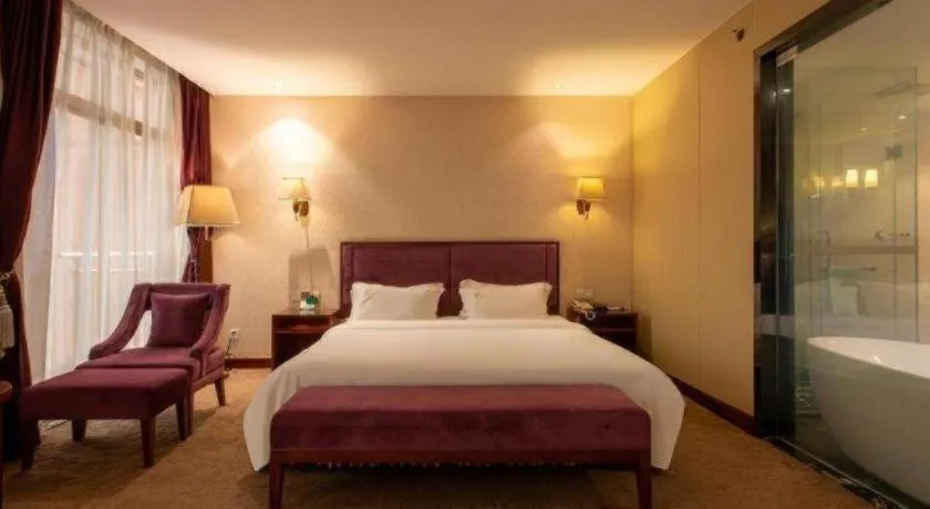 Bed in Shunde Emperor Hotel