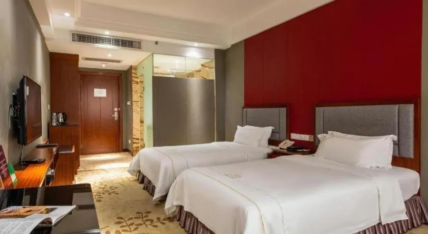 Bed in Shunde Emperor Hotel