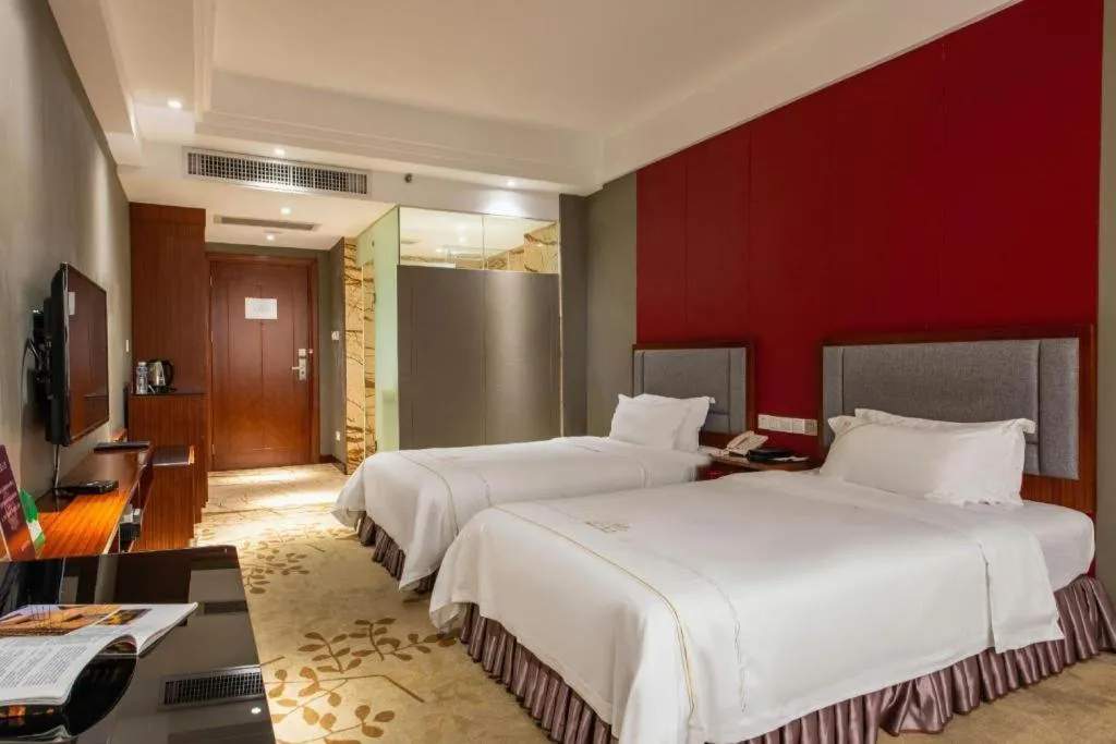 Bed in Shunde Emperor Hotel