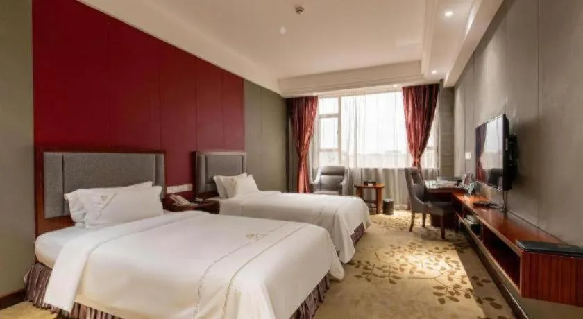 Bed in Shunde Emperor Hotel